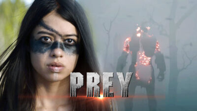Prey | O Predador: A Caçada – FERAL em combate com seu armamento contra os colonizadores e comanches